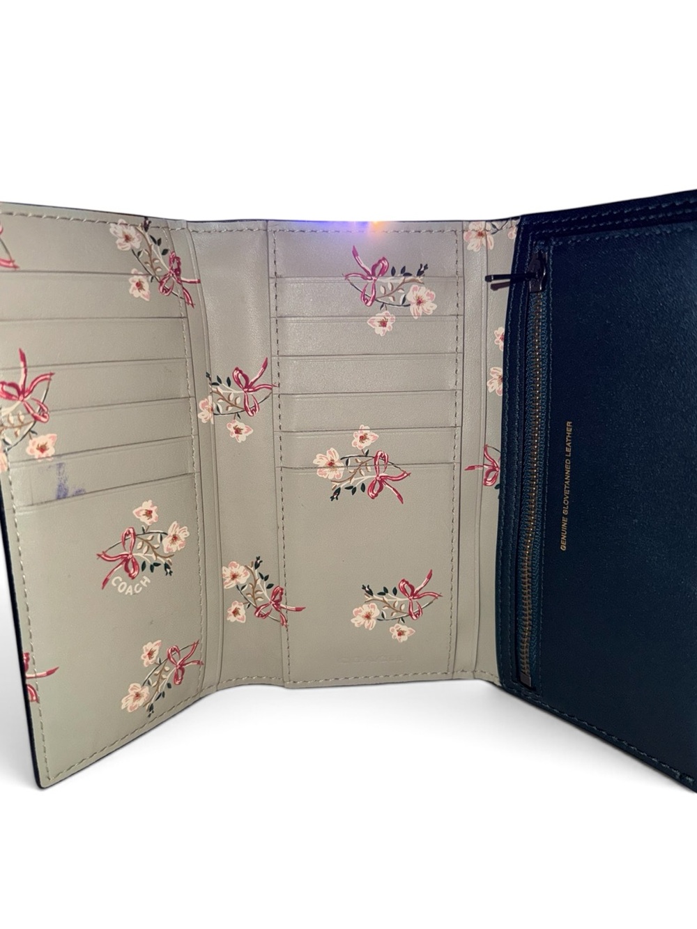 Coach Slim Trifold Wallet with a Floral Bow Print Interior